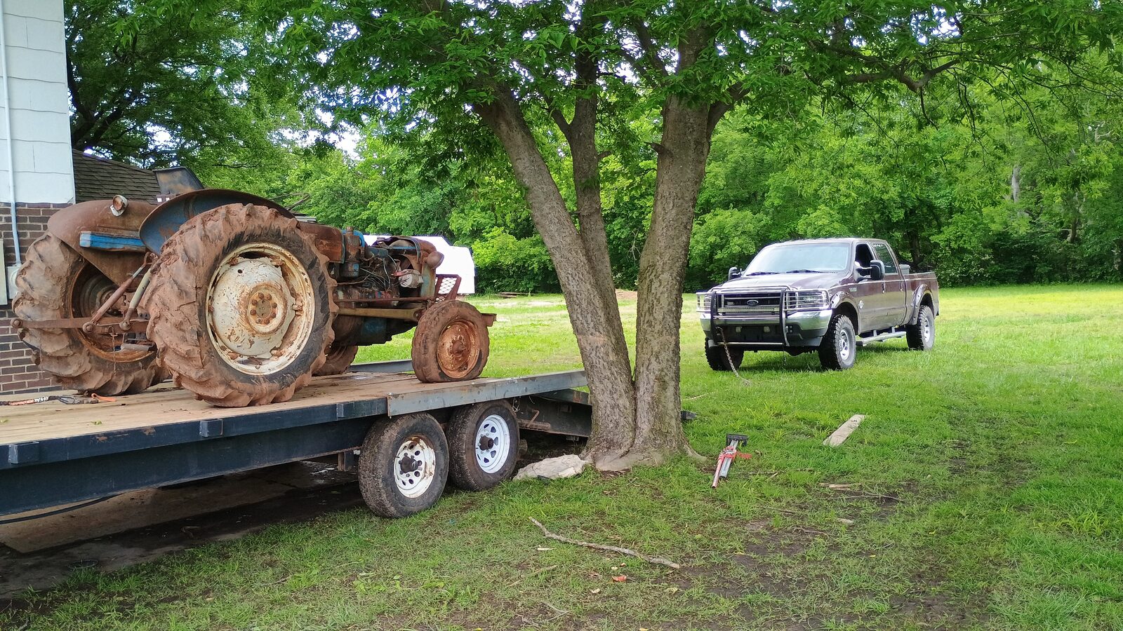 The full rig — tractor on trailer with the truck