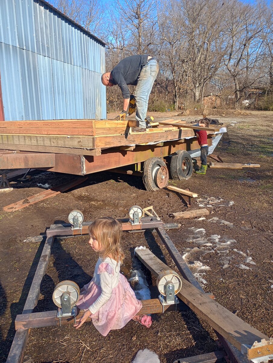 Kids on the kiln cart dolly rails