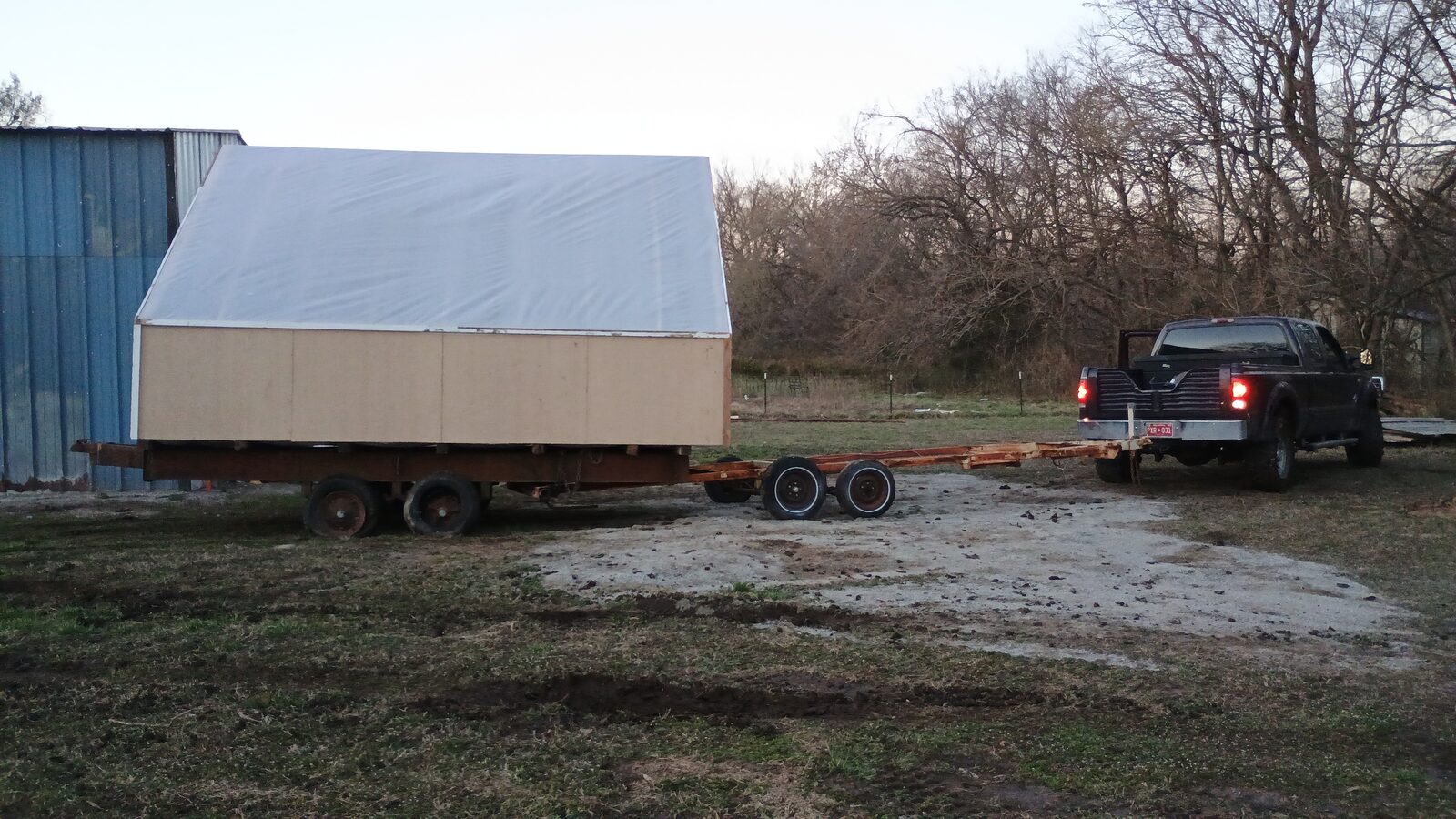 Full kiln on the trailer, truck taillights on, ready to roll